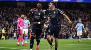 Cú đúp Vinicius Jr mang Real Madrid vào tứ kết