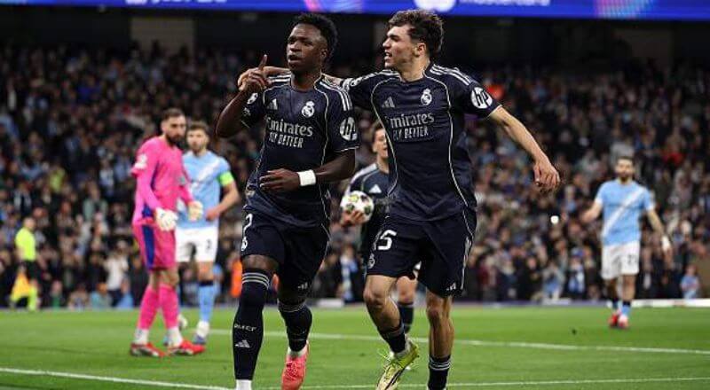 Cú đúp Vinicius Jr mang Real Madrid vào tứ kết